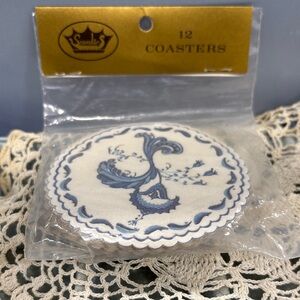 Scandies" brand coasters, featuring a blue and white reminiscent of Delftware.
